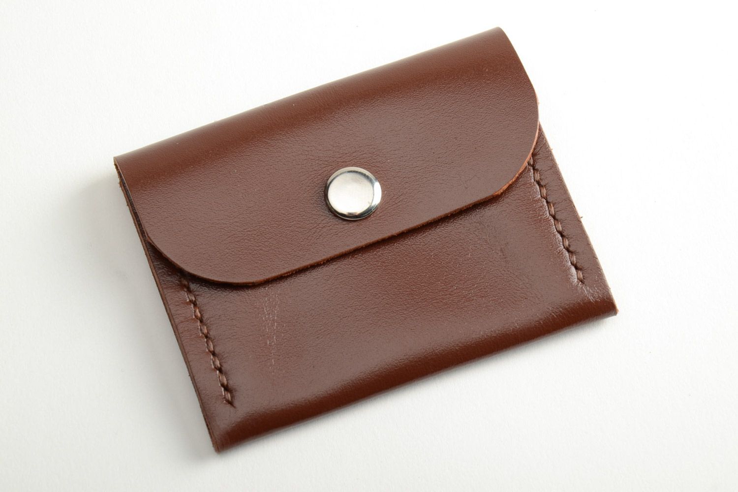 Handmade men's coin purse sewn of genuine leather of brown color with metal stud photo 2