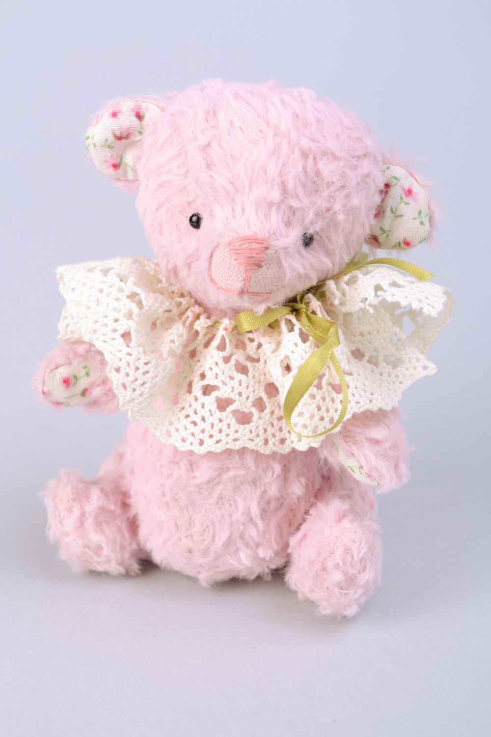 Handmade designer soft toy bear sewn of fabric of pink color with lacy collar  photo 1