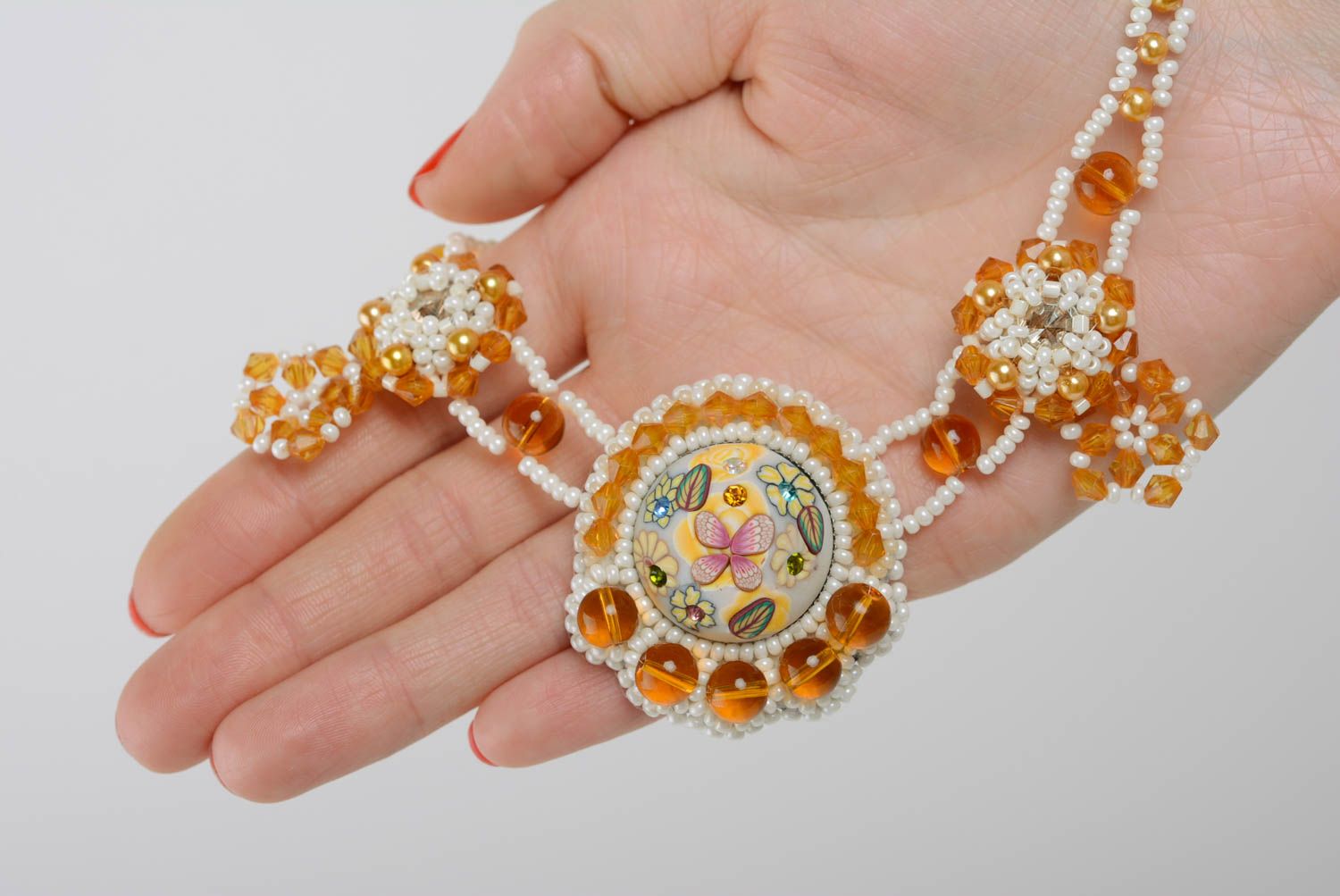 Handmade light bead embroidered white and yellow necklace on chain with crystals photo 3