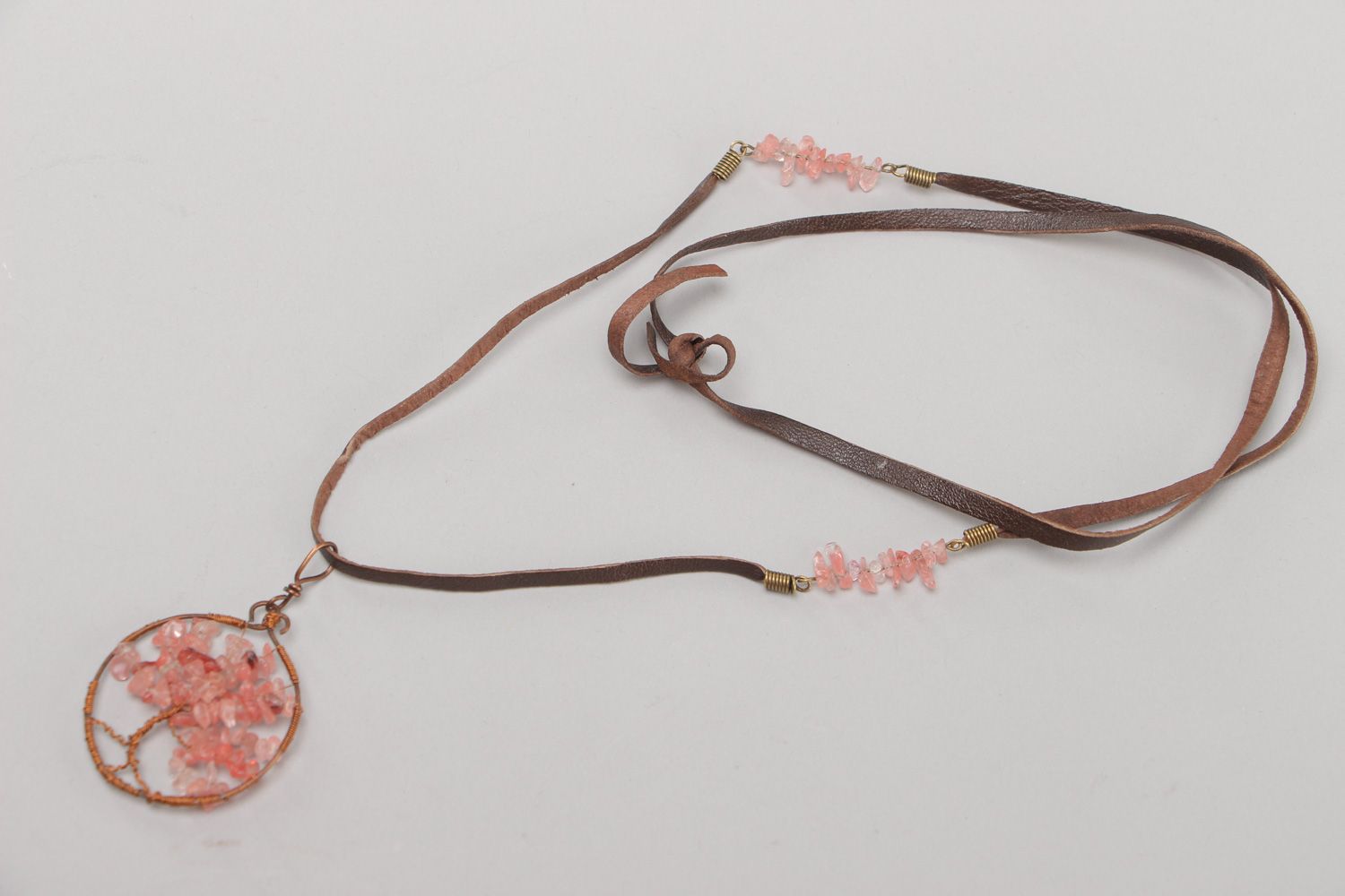 Elegant handmade wire wrap pendant necklace with pink quartz on leather cord photo 2