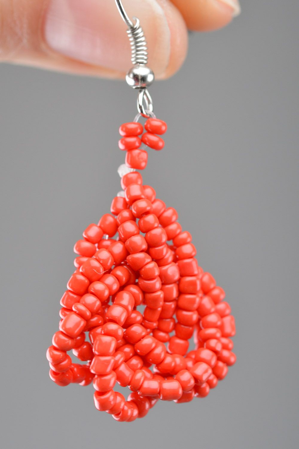 Handmade festive dangle earrings woven of Czech beads of red color photo 3