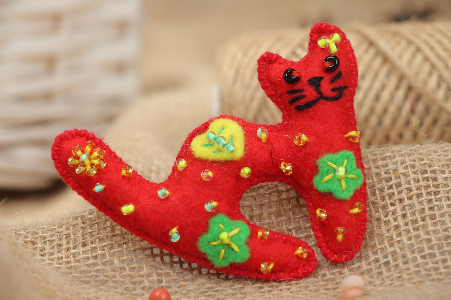 Bright red handmade soft toy kitten sewn of felt for decor of child's room  photo 1