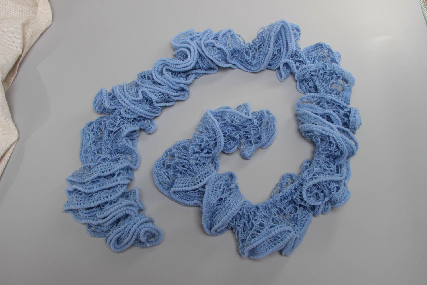 Beautiful stylish women's handmade narrow crochet scarf of blue color photo 2
