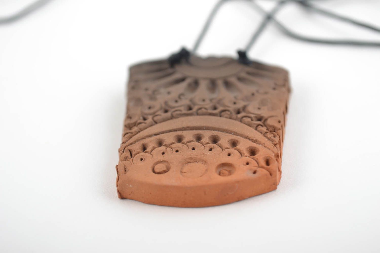 Beautiful unusual handmade long pendant made of red clay on lace photo 3