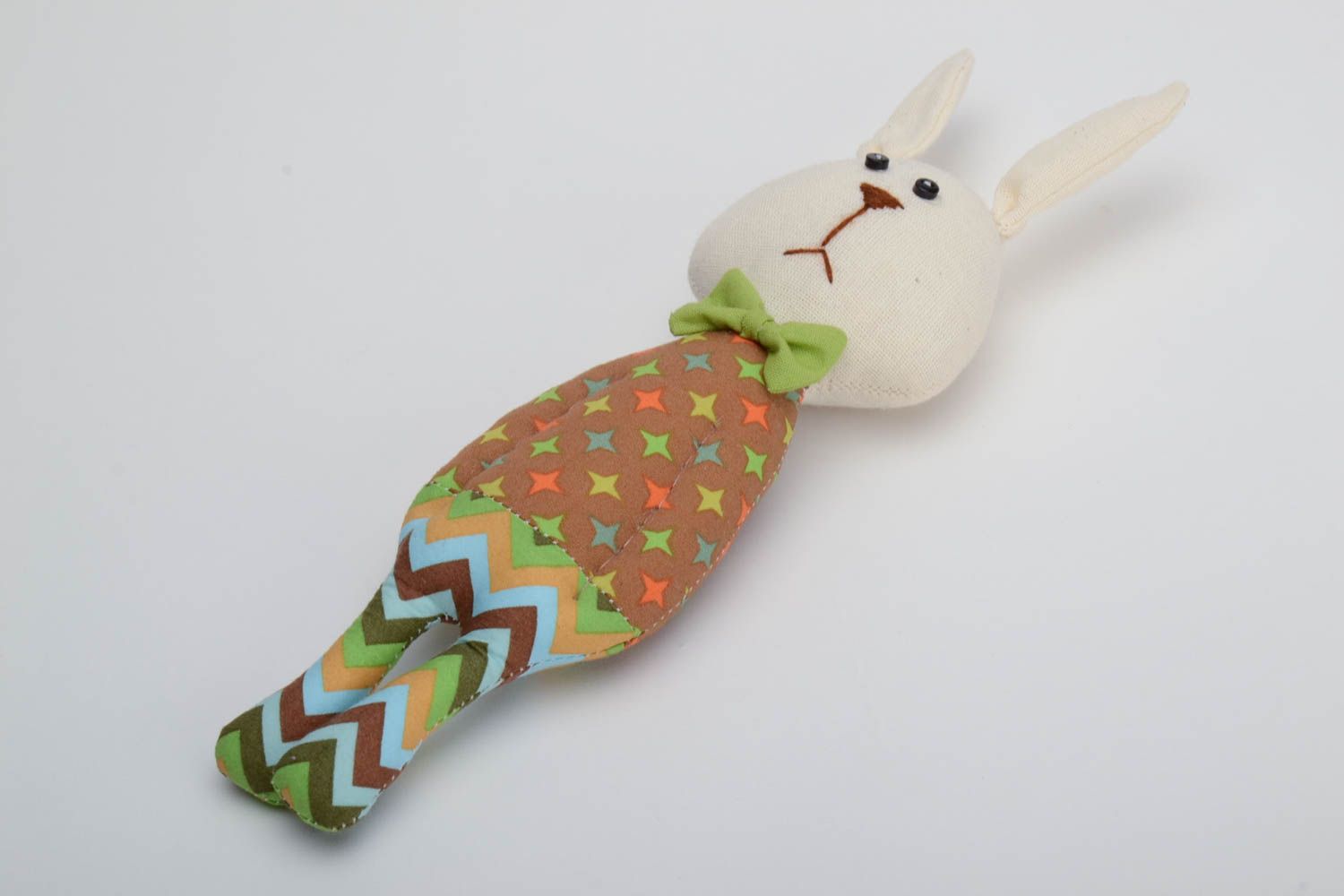 Handmade cotton fabric soft toy funny rabbit in colorful suit with green bow tie photo 2