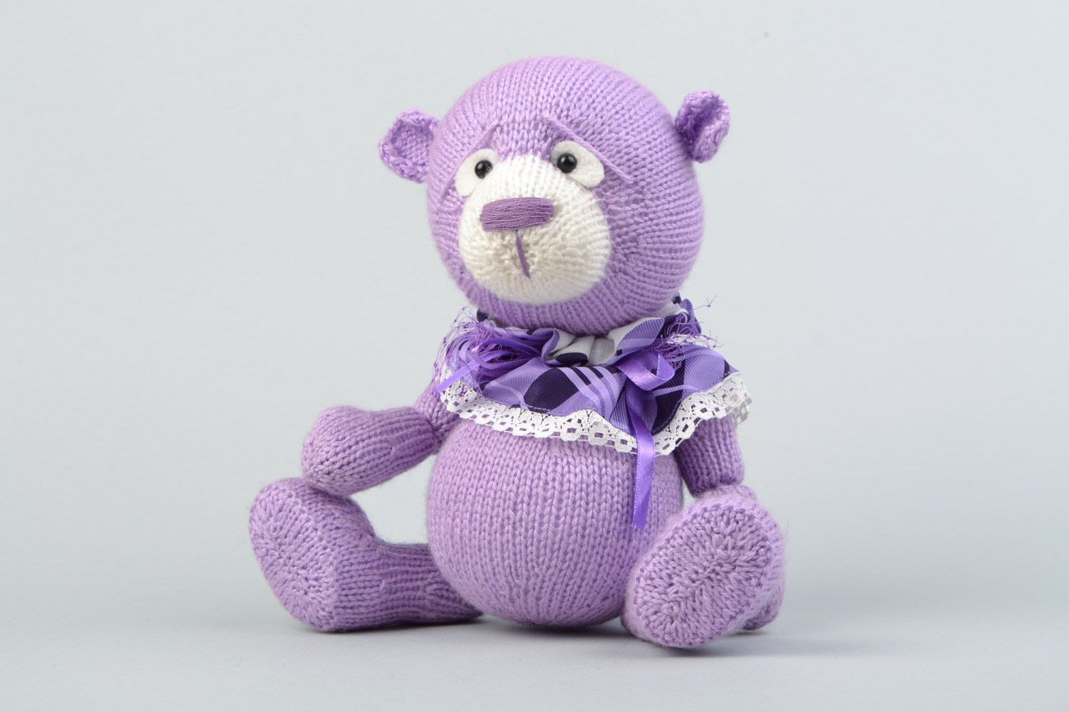 Handmade decorative crocheted purple bear toy with a bow for children photo 1