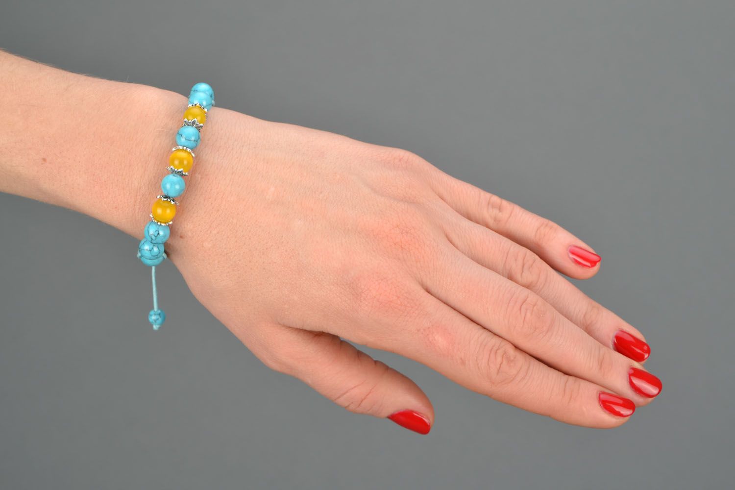 Handmade bracelet with turquoise and cat's eye photo 1