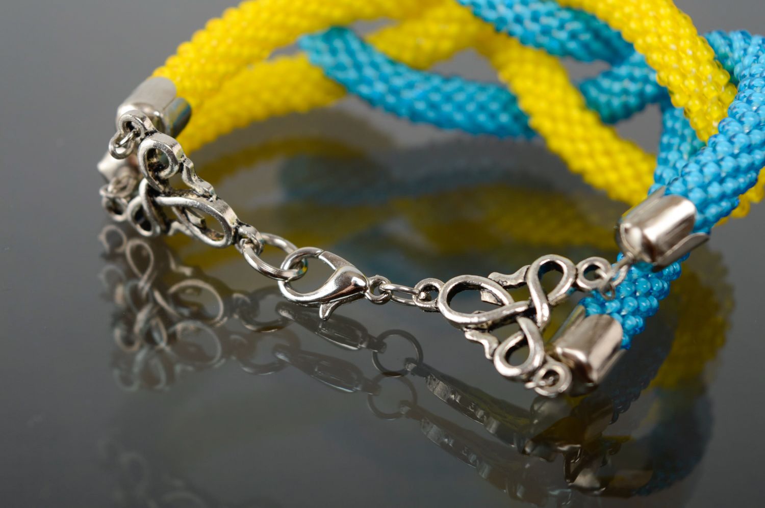 Bracelet tressé en perles de rocaille Jaune-bleu photo 4