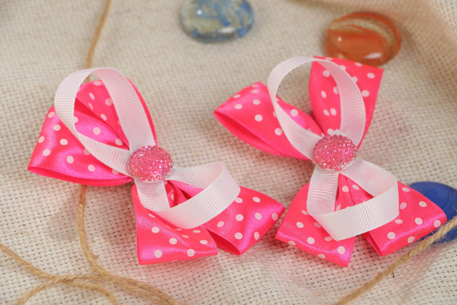 A set of 2 handmade designer bobby pins made of satin ribbon in the form of pink bows photo 1