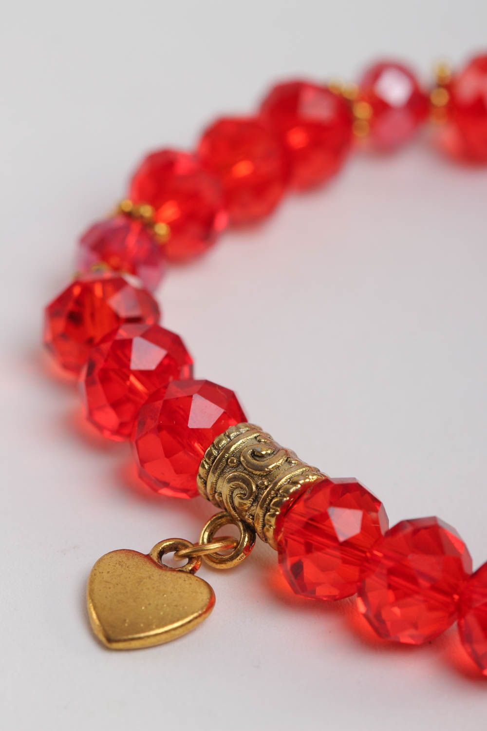 Handmade crystal beaded bracelet in red color with heart centerpiece photo 3