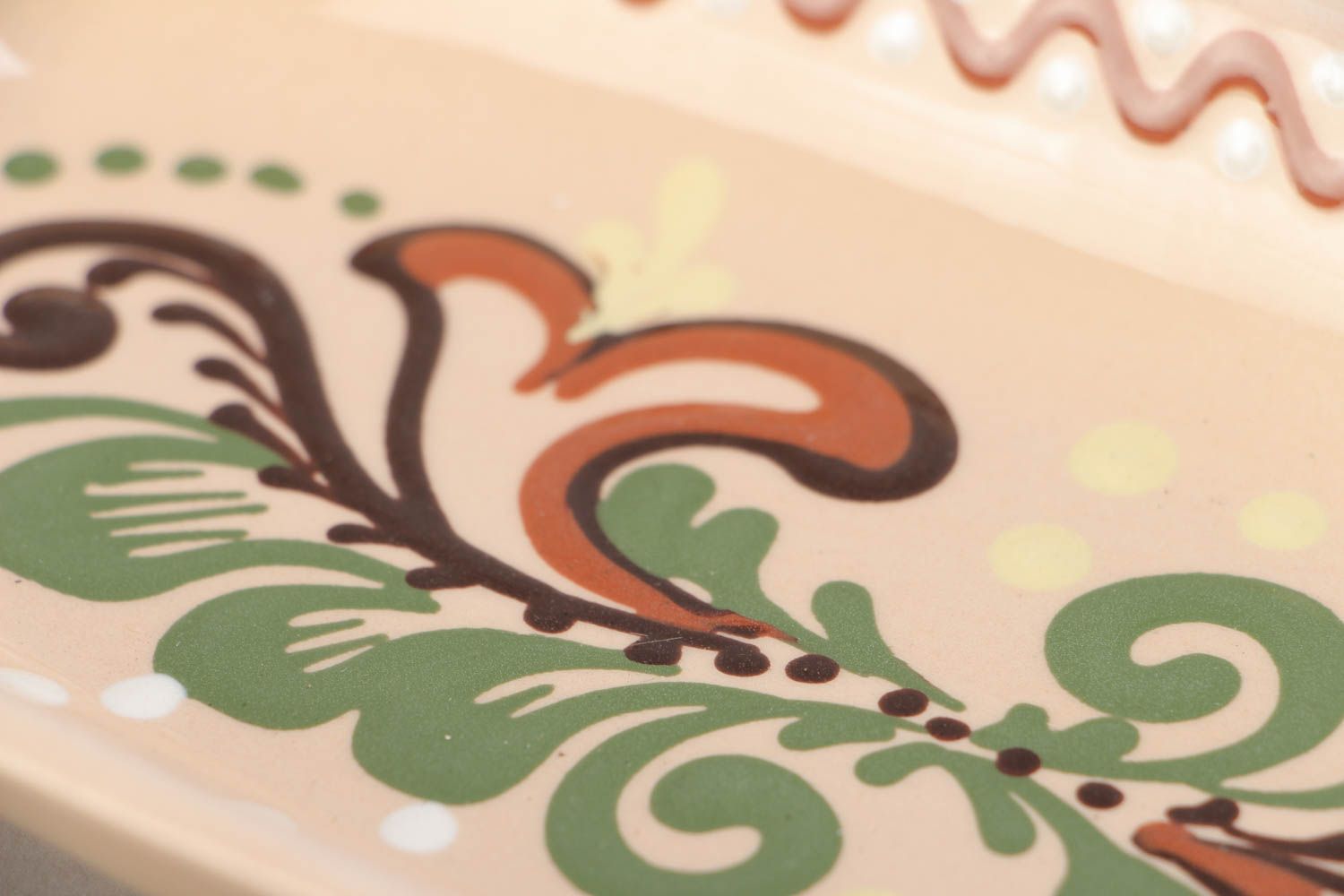 Homemade long ceramic dish ornamented with colorful glaze for serving fish photo 4