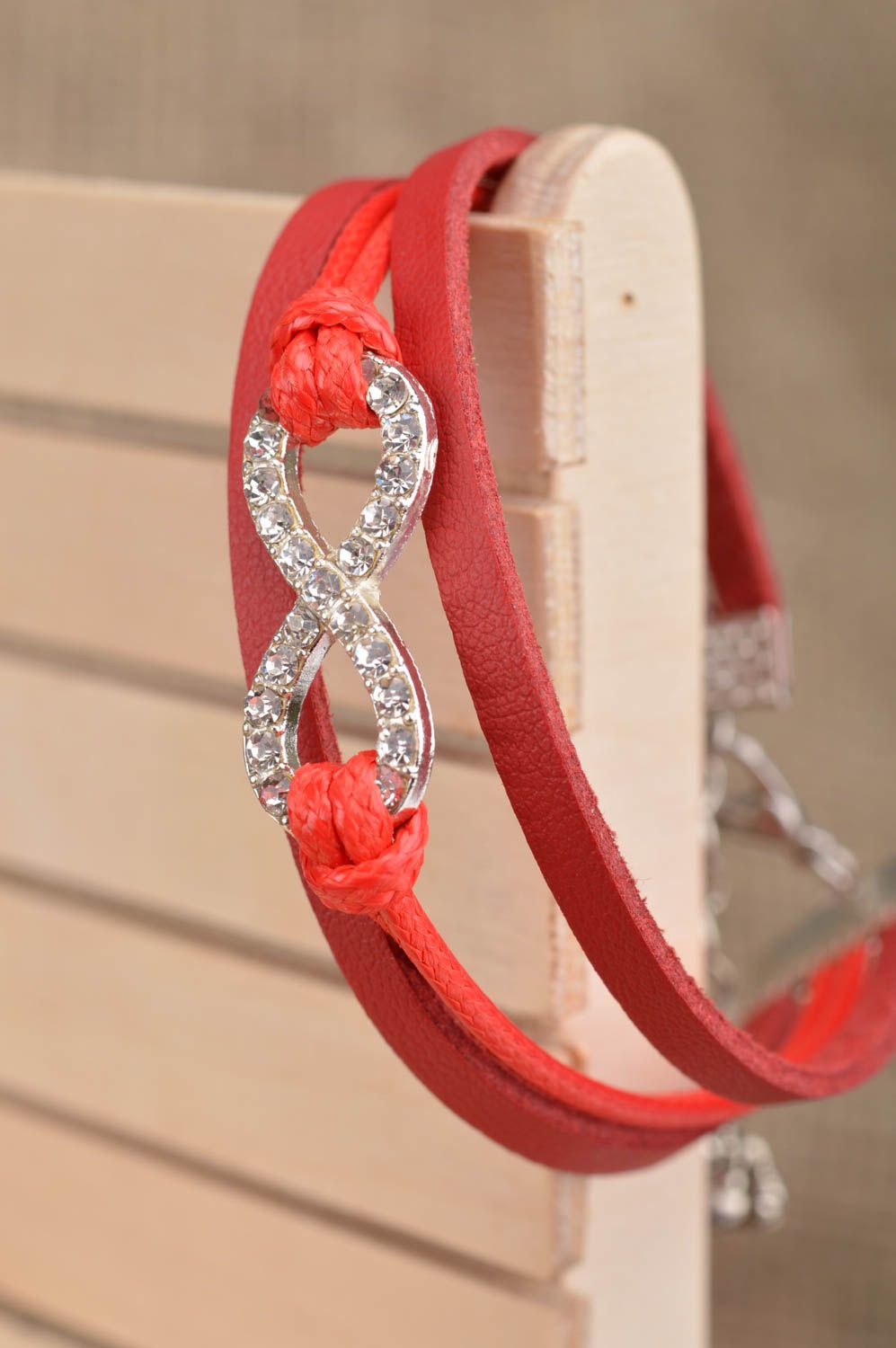 Handmade designer red thin genuine leather bracelet with infinity sign insert photo 1