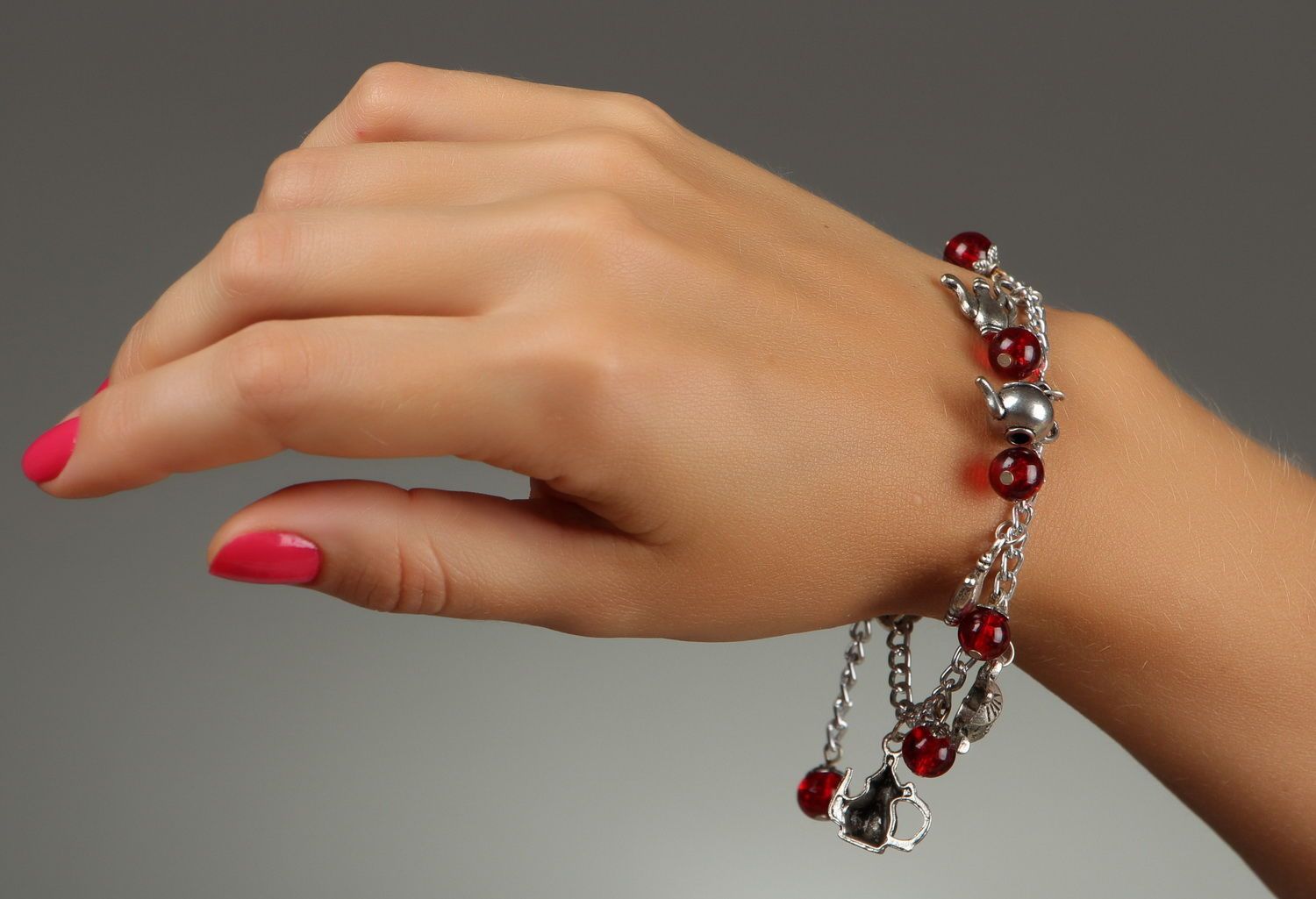 Bracelet en acier et perles de verre Théières photo 4