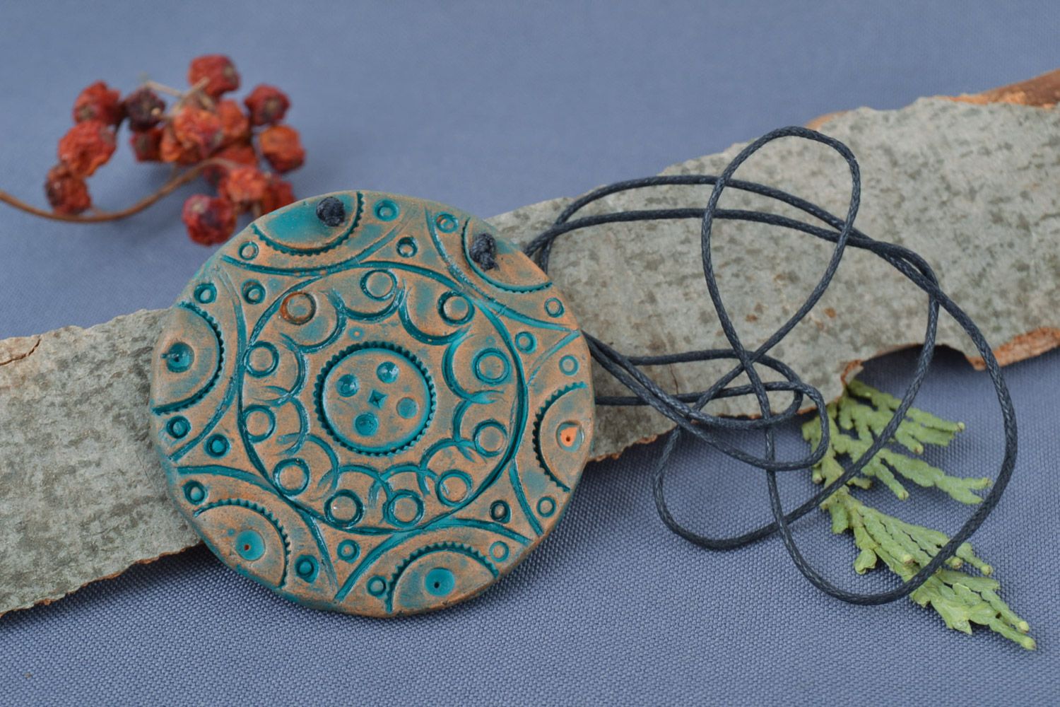 Handmade large painted ceramic pendant of round shape with ethnic ornaments  photo 1