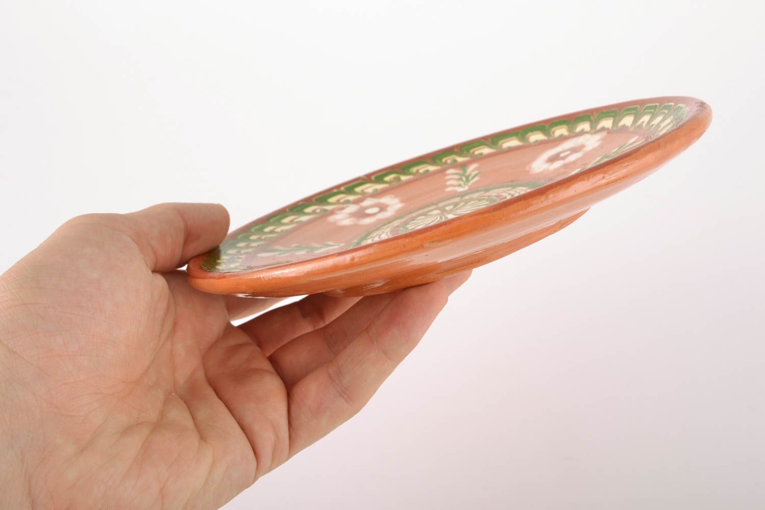 Flat ceramic plate with wave-shaped ornament photo 4