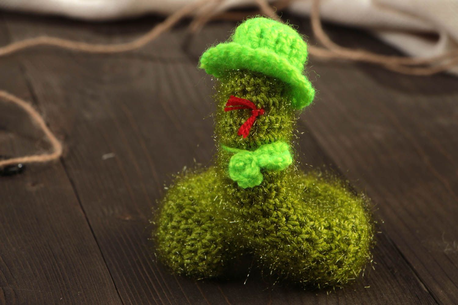 Beautiful handmade soft toy crocheted of acrylic threads green snake in hat photo 1