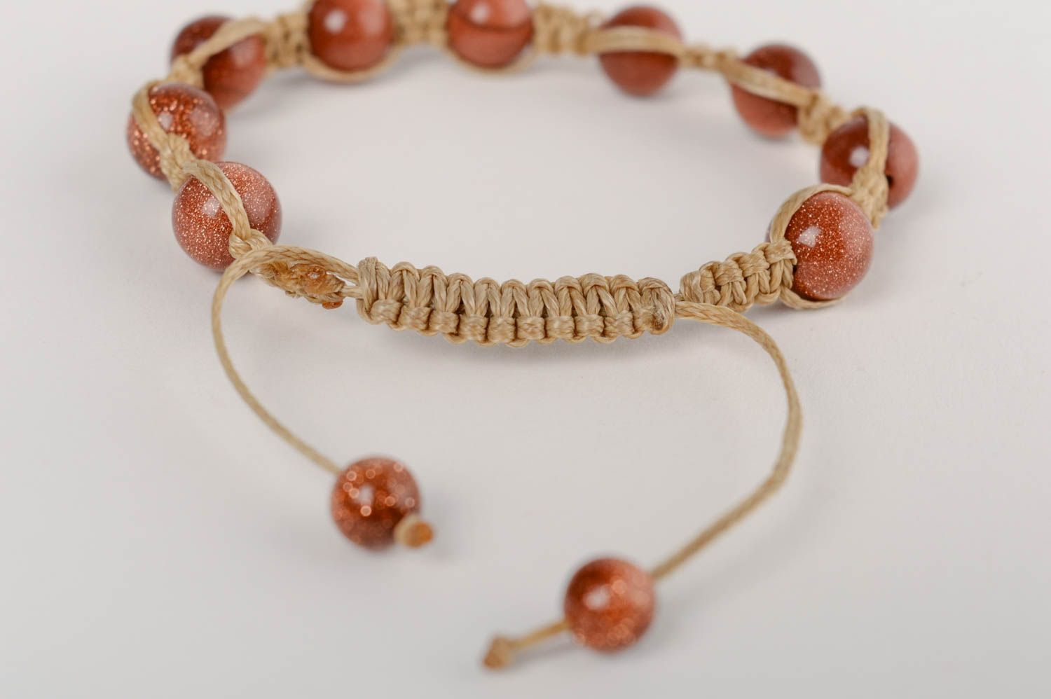 Beautiful handmade designer brown macrame woven bracelet with natural stone photo 3