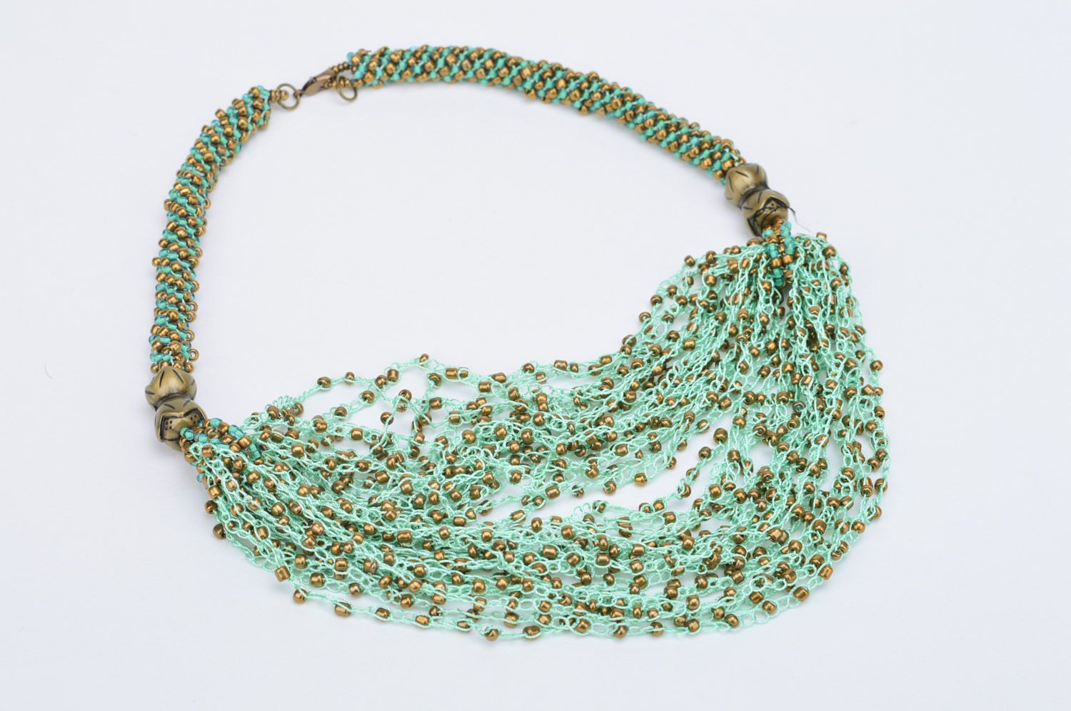 Beautiful women's handmade beaded necklace in gold and green colors photo 2