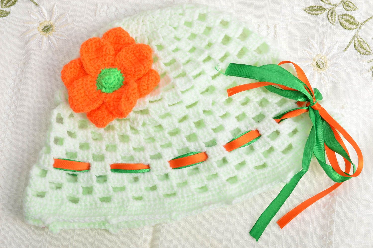 Handmade hat for girls crocheted of lime threads decorated with knitted flower photo 1