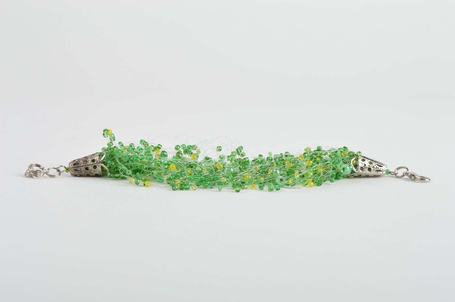 Handmade airy green wrist bangle bracelet crocheted of light green beads and fishing line  photo 4