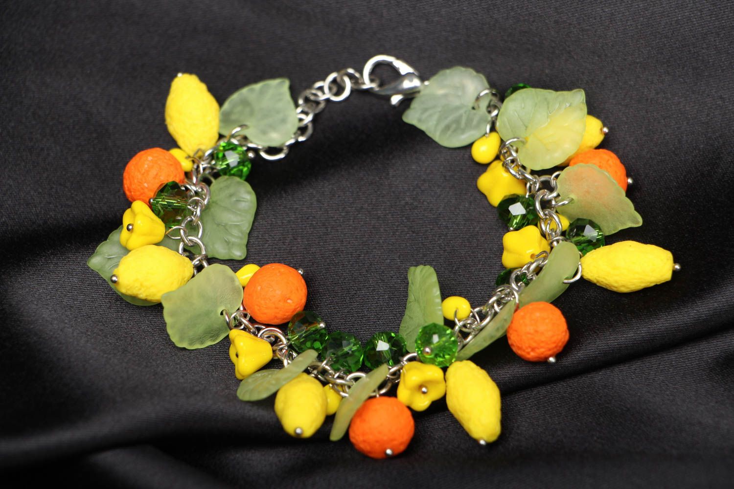 Plastic bracelet with charms photo 1