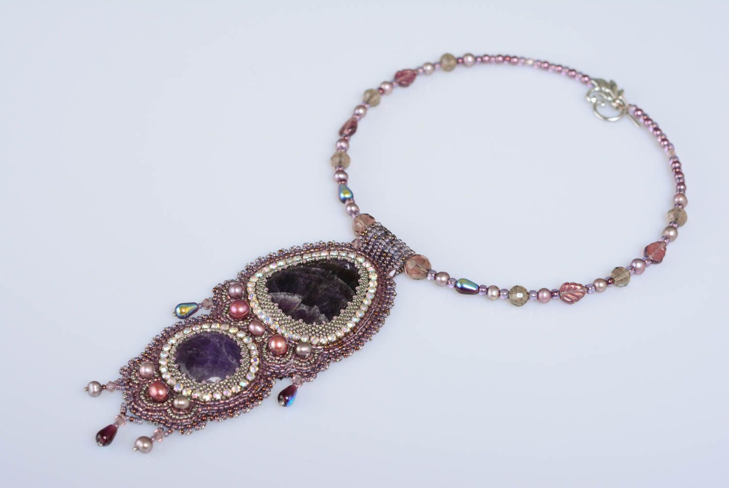 Handmade designer necklace with pendant embroidered with beads with amethyst photo 1