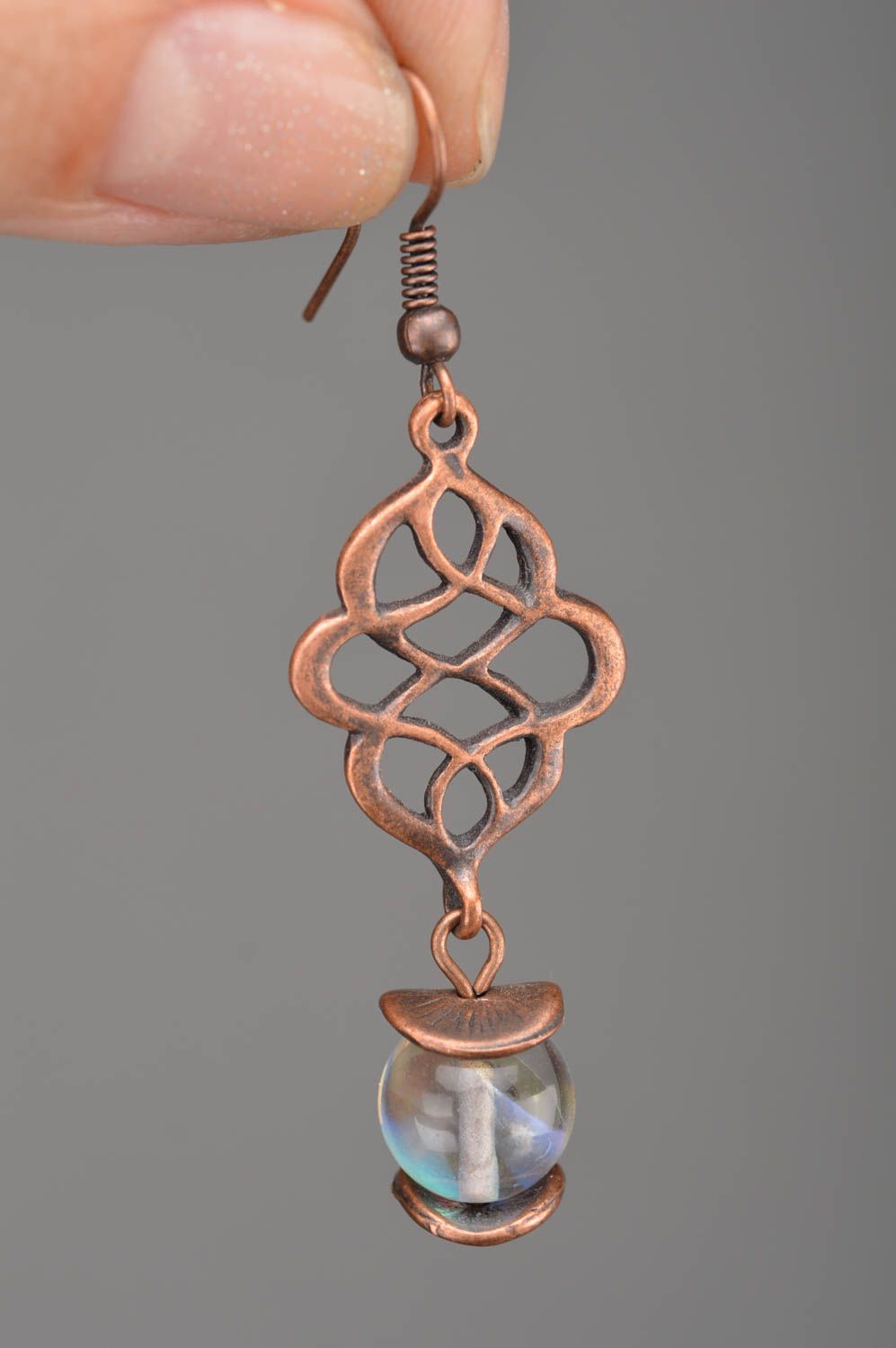 Handmade openwork stylish beautiful long earrings made of metal with beads photo 2