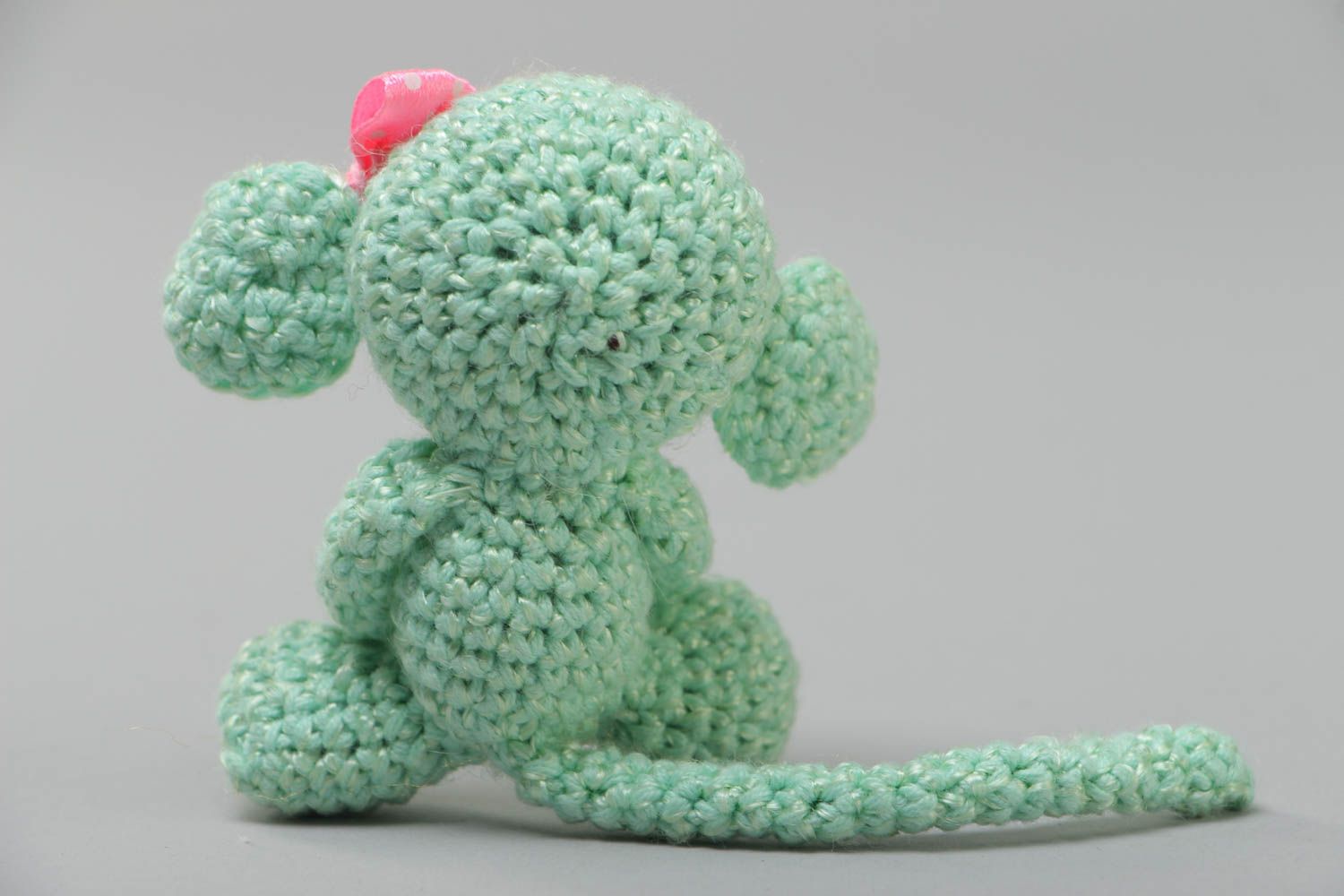 Handmade small funny soft toy crocheted of acrylic threads Green Monkey with bow photo 4