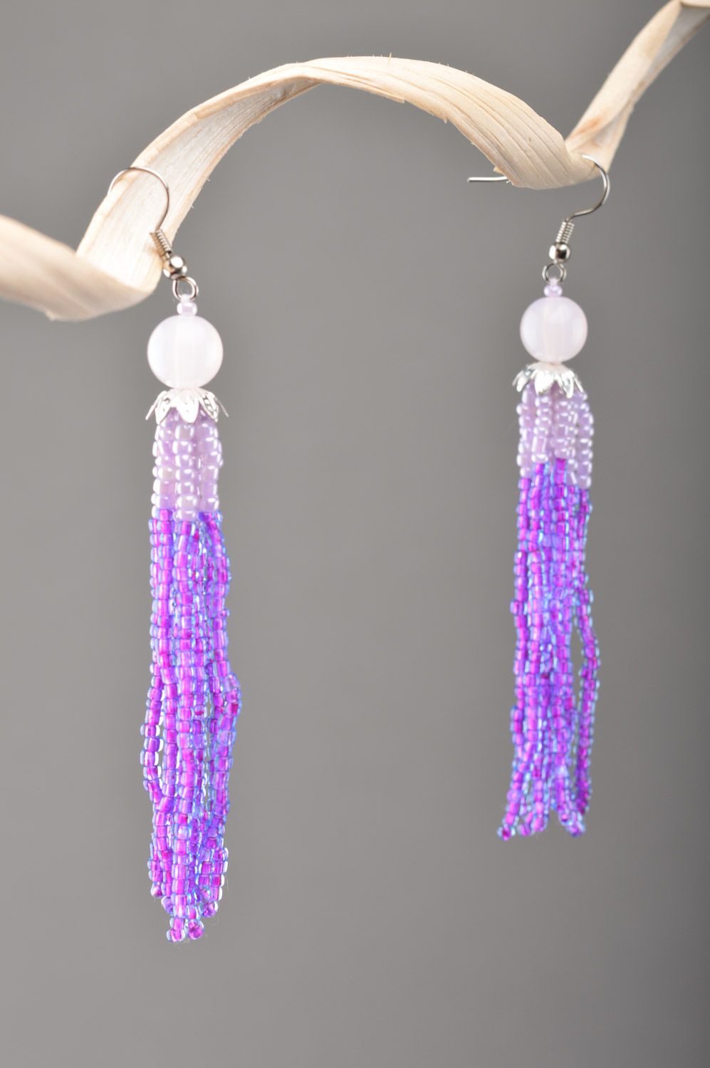 Handmade women's lilac long beaded earrings with charms  photo 4