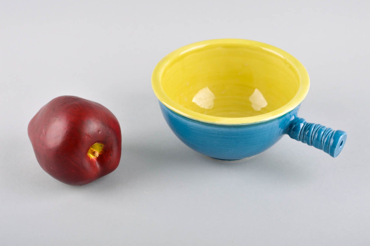 Ceramic blue and yellow color ceramic cup for kids with stick handle photo 1