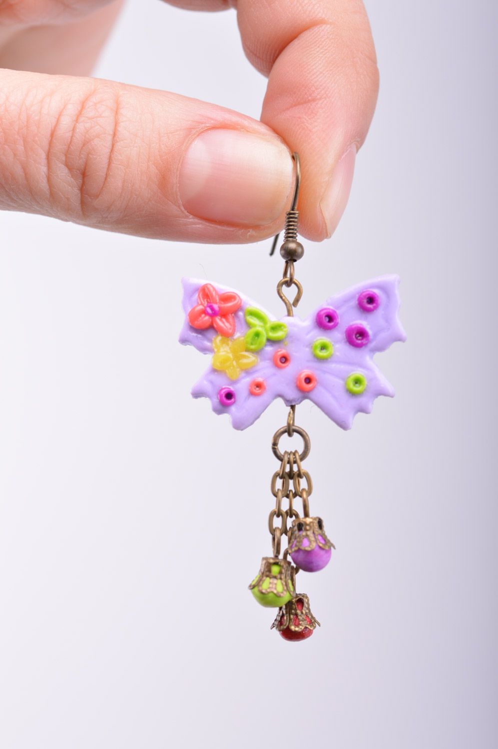 Handmade bright women's polymer clay earrings with charms in the shape of butterflies photo 1