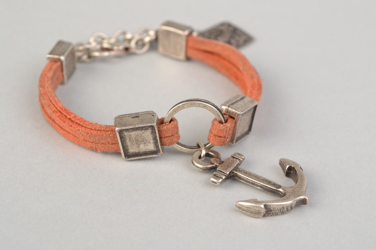Thin handmade suede wrist bracelet with hypoallergenic metal charms unisex photo 3