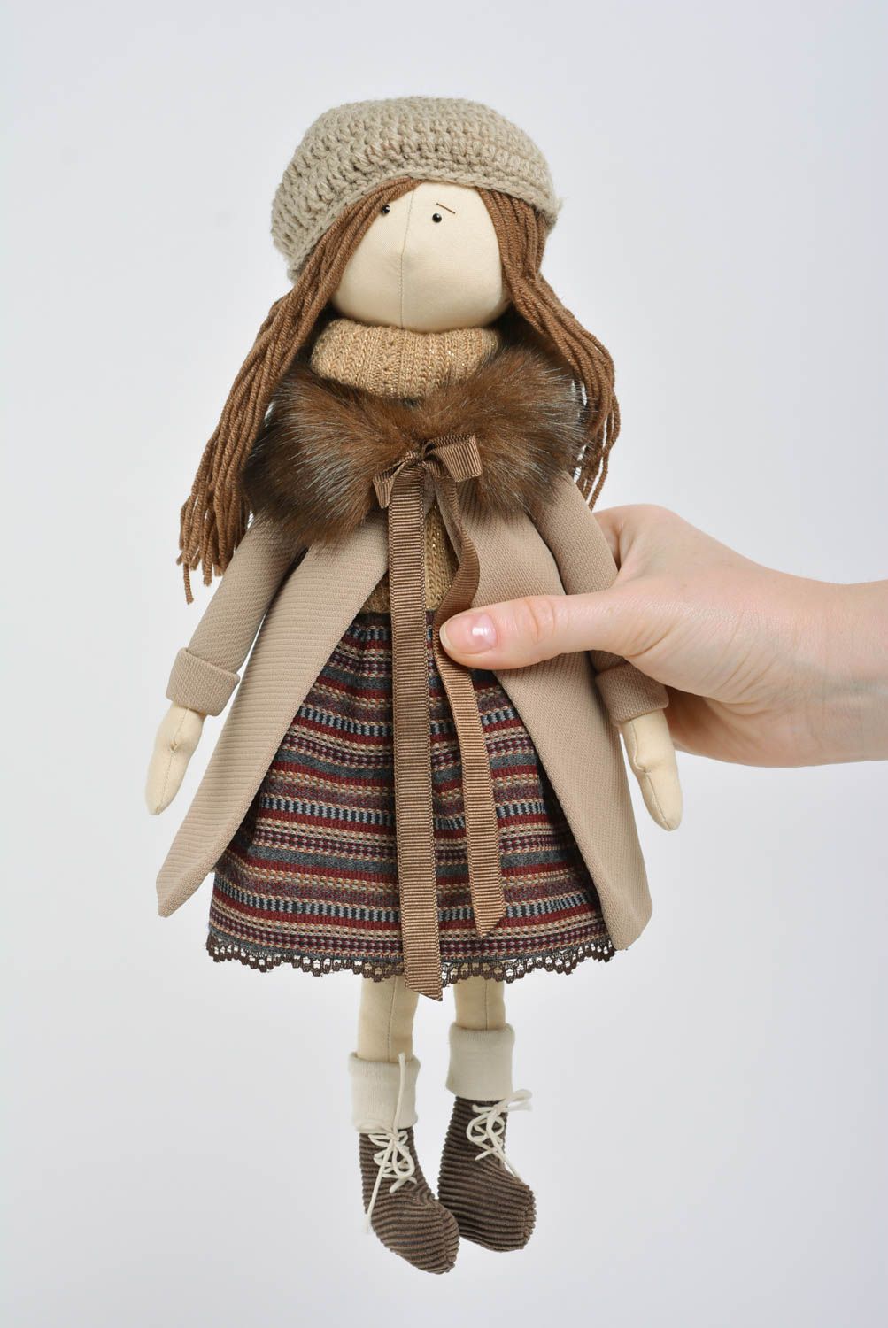Small handmade beautiful fabric soft doll girl in coat for gift and home decor photo 5
