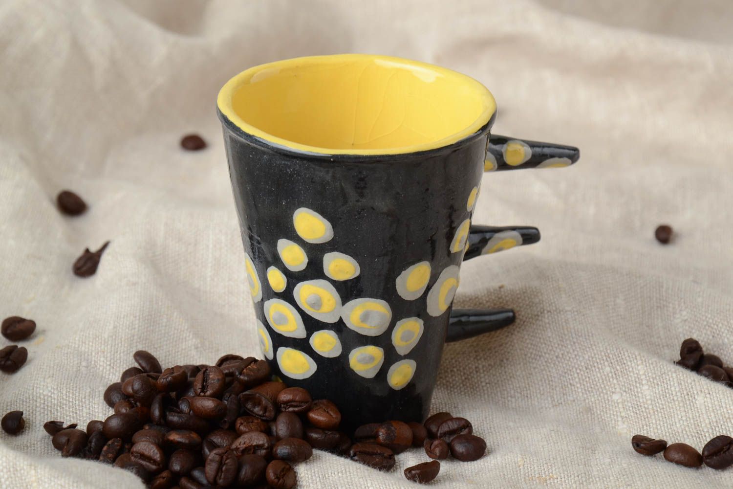 Ceramic art coffee 10 oz cup in black and yellow colors with unique three stick handle photo 1