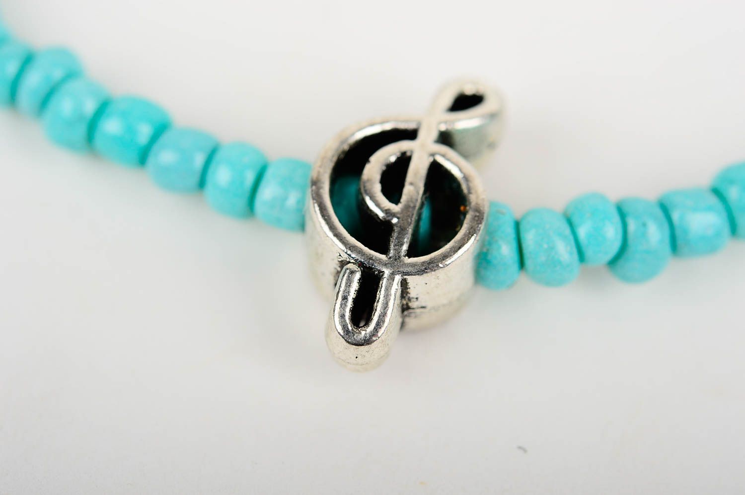 Turquoise handmade beaded bracelet with treble clef charm for young girls photo 4