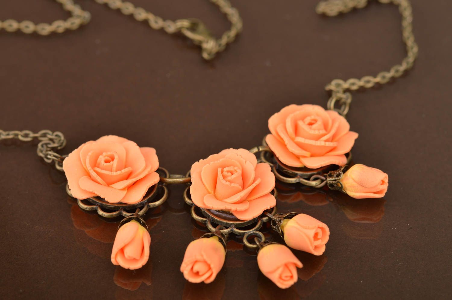 Handmade cute pendant made of polymer clay on chain with peach flowers photo 5