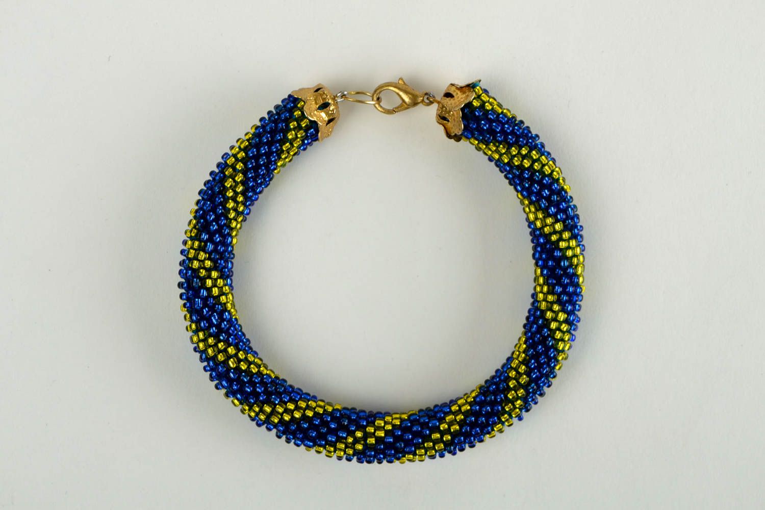 Beaded cord bracelet in dark blue and yellow beads for young girls photo 4
