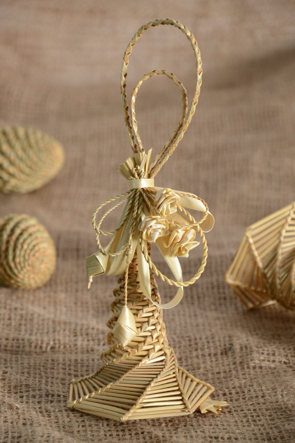Handmade small hanging bell woven of straw for interior decoration photo 1