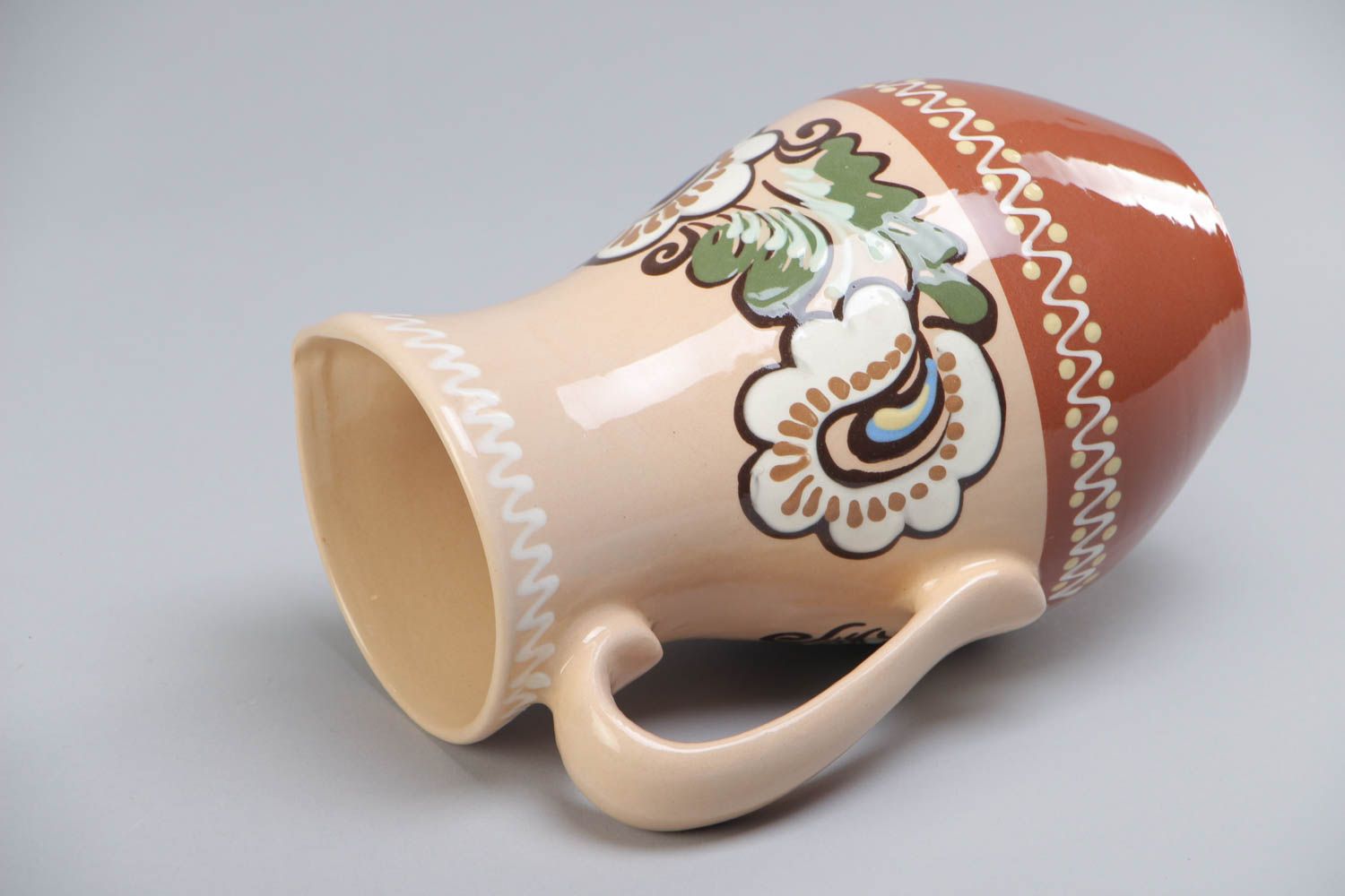 Originelle handgemachte keramische Kanne mit Henkel mit Bemalung im Ethno Stil  foto 4