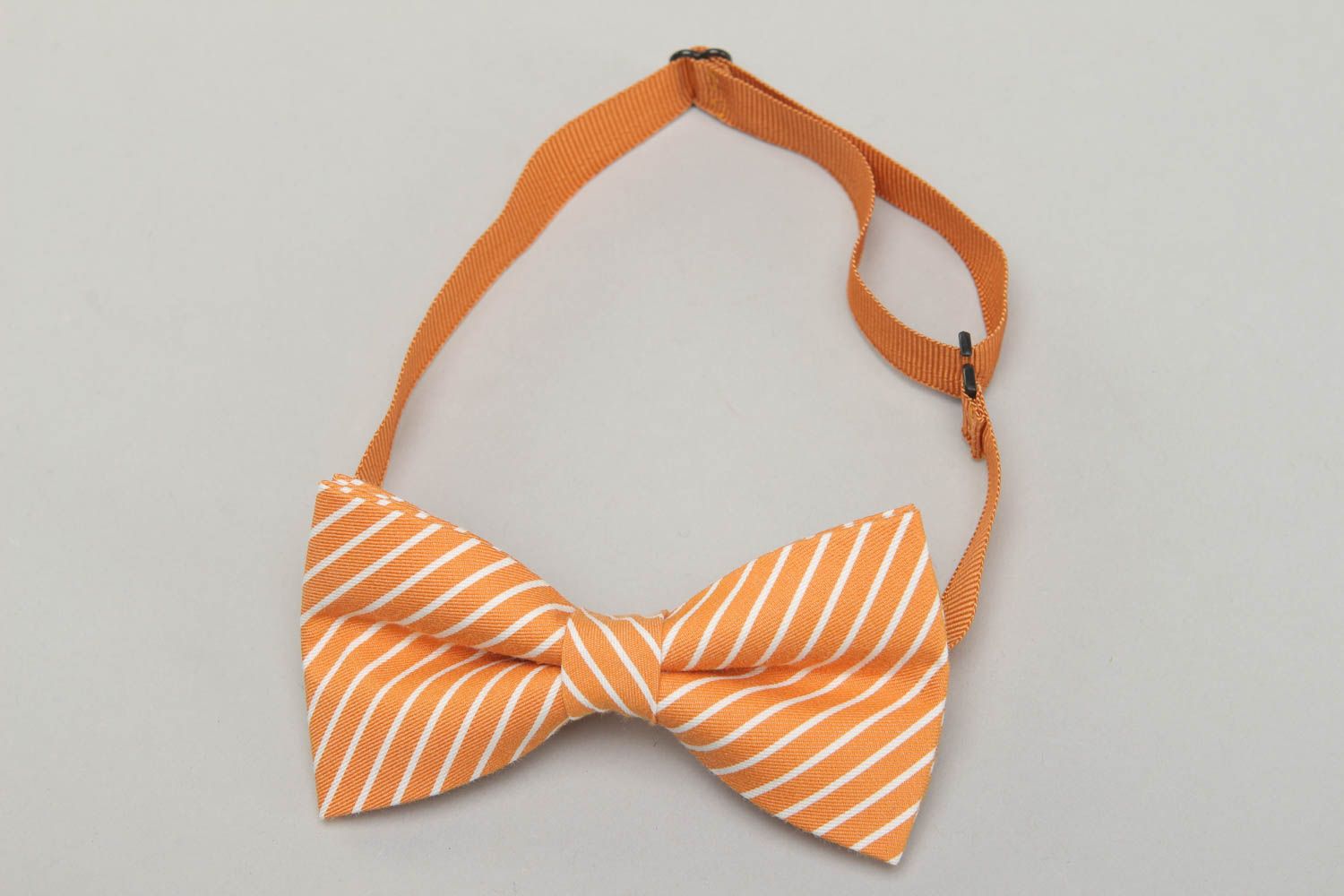 Striped orange cotton bow tie photo 1
