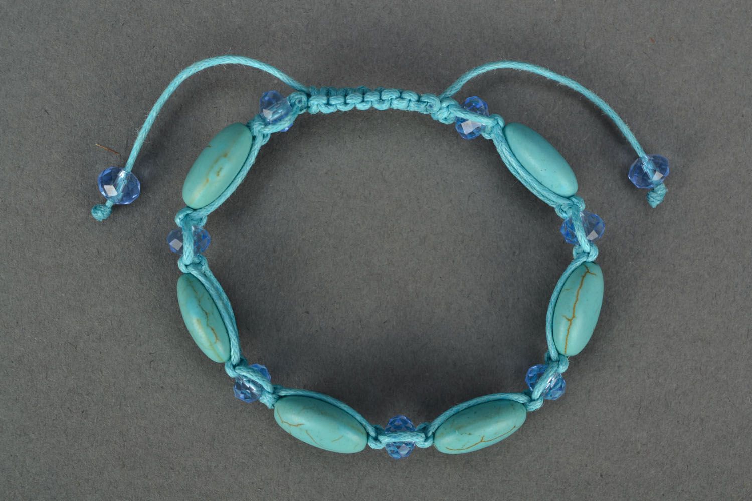 Bracelet woven of beads and cord photo 2