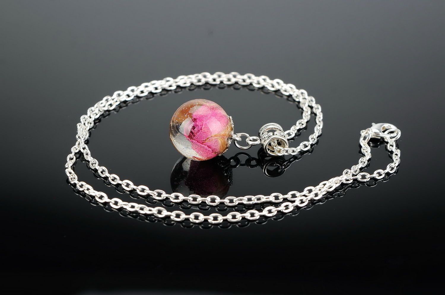 Pendant with natural flowers Rose in a ball photo 1