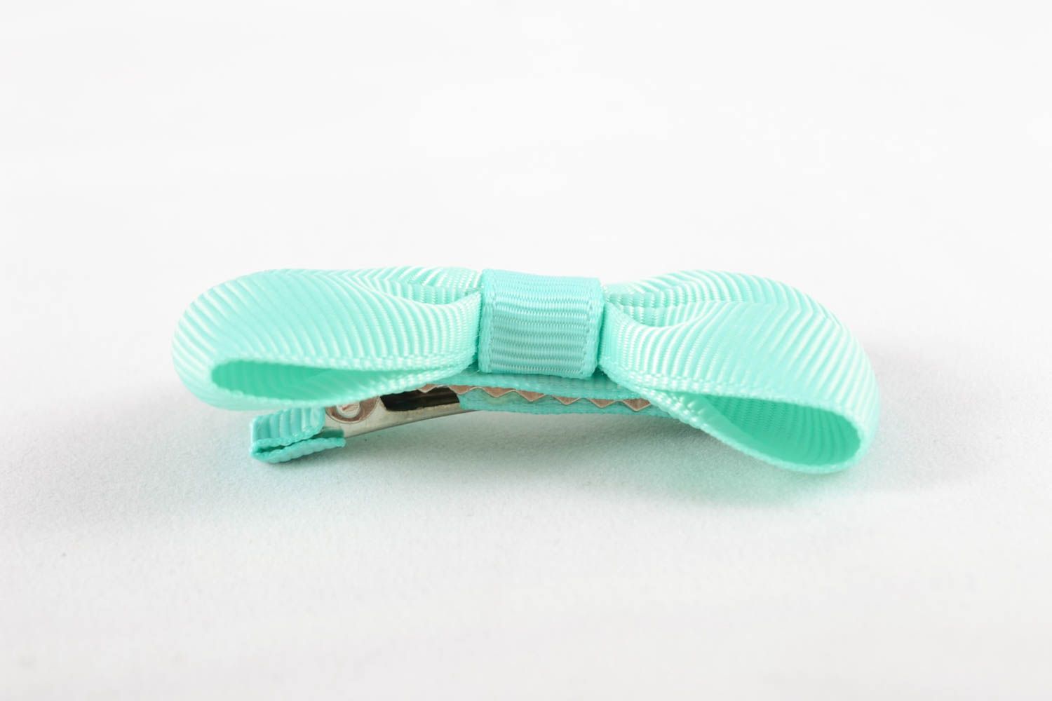 Hair clip with rep ribbon bow of turquoise color photo 4