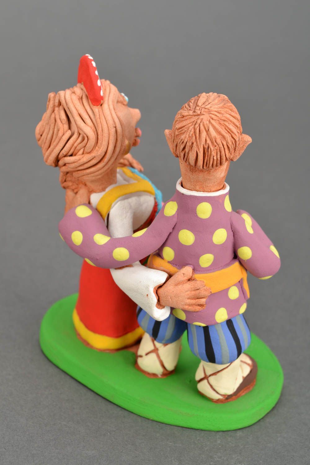 Bright ceramic figurine Cossack and woman photo 5