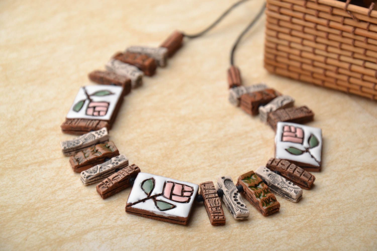 Ceramic necklace with ornament photo 1