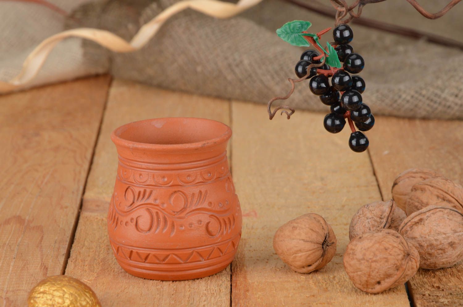 Small decorative ornamented ethnic handmade ceramic shot glass 0.05 l  photo 1
