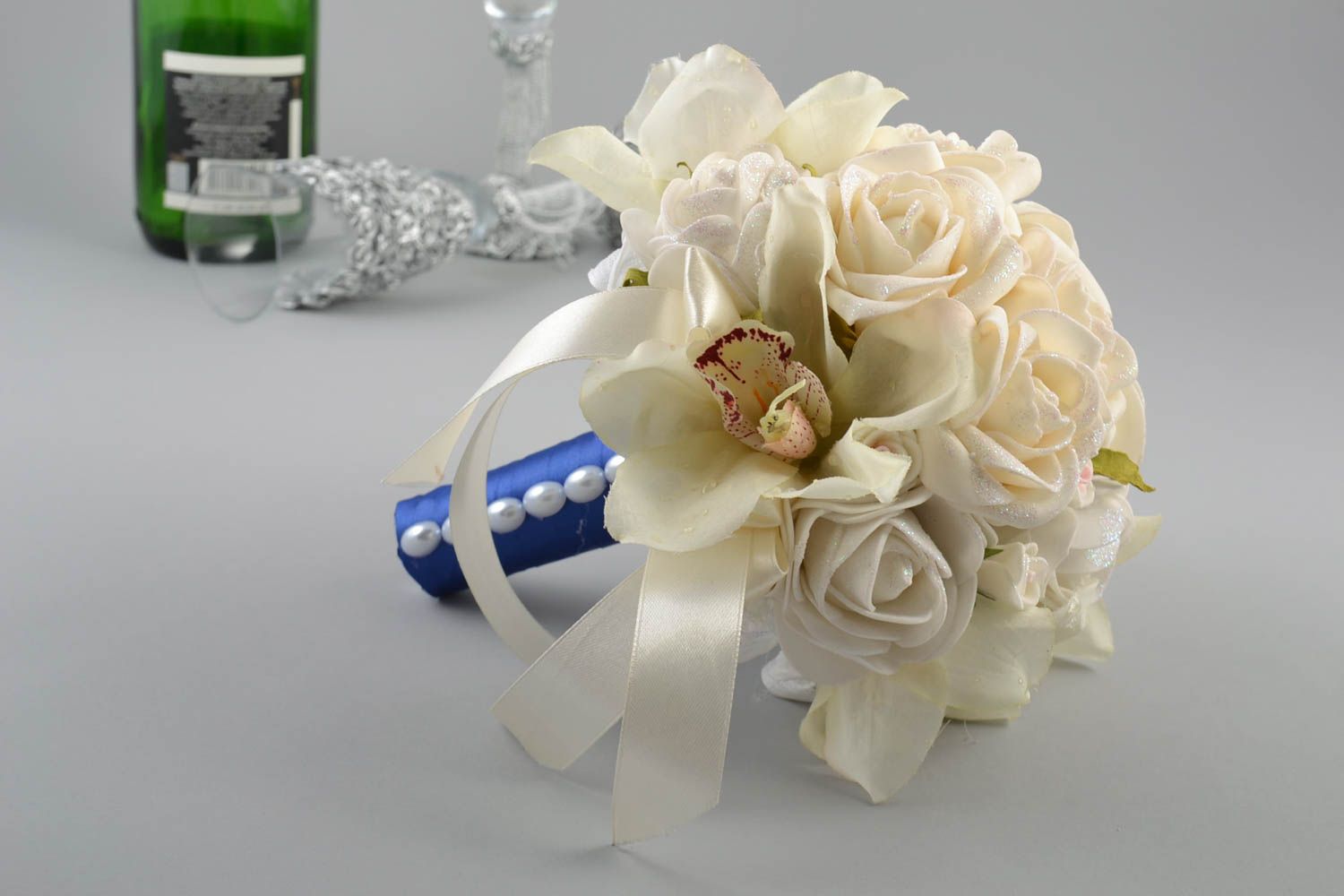 Handmade cute white wedding bouquet made of foamiran on blue stem with ribbons photo 1