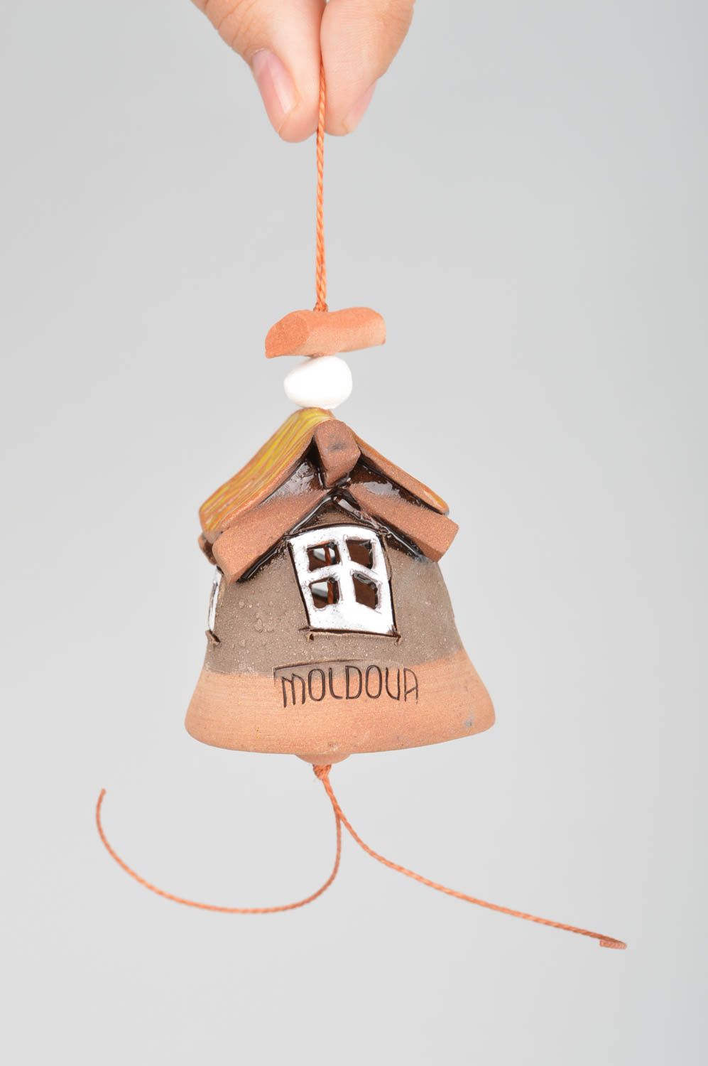Handmade decorative wall hanging ceramic bell house with glazed yellow roof photo 3