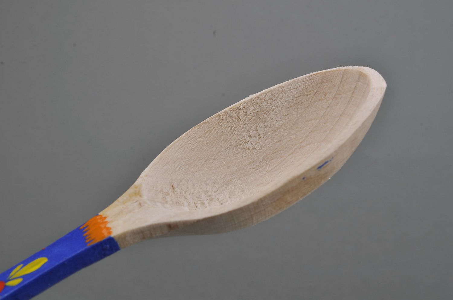 Wooden teaspoon with blue handle photo 3