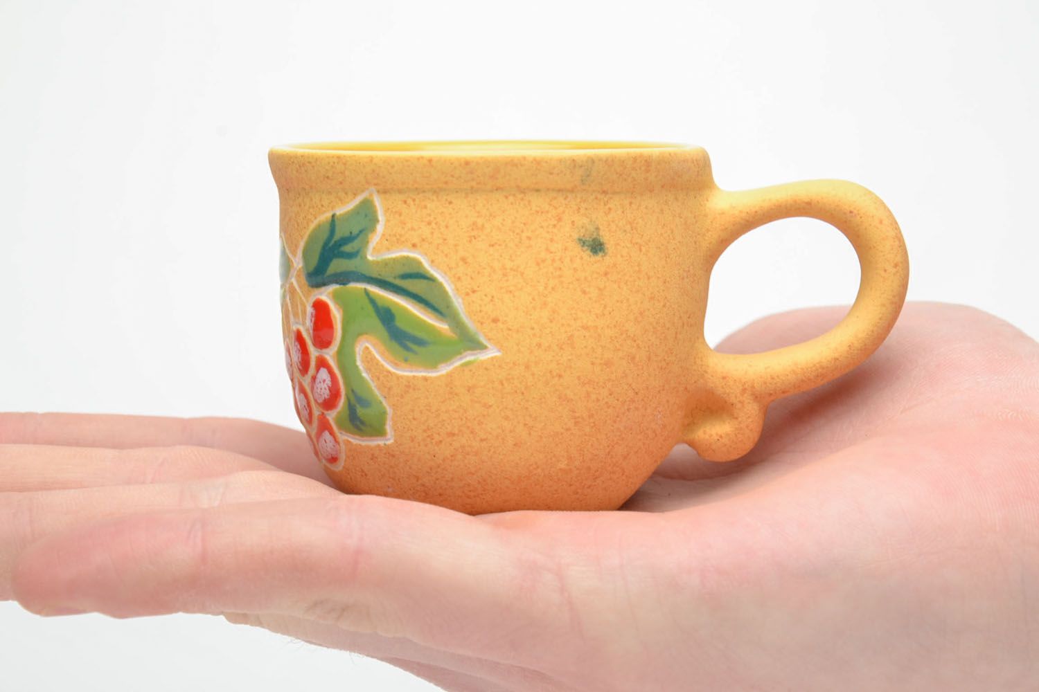 Small floral pattern 3 oz clay cup in yellow color with handle photo 1